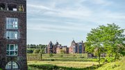 Uitzicht vanaf landgoed Kasteel Haverleij over de groene omgeving richting naastgelegen kasteel Lelienhuyze door Frans Blok (bron: Shutterstock)