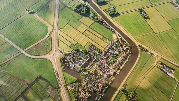 Birdview Nederland landschap -> Photo by Mika Korhonen on Unsplash door Mika Korhonen (bron: Unsplash)