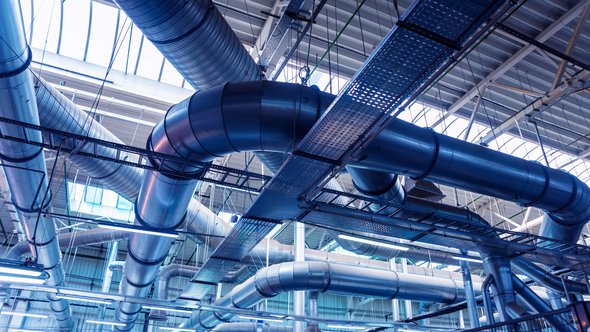Air conditioning of buildings. Background of ventilation pipes. Laying of engineering networks. Industrial background door Roman Zaiets (bron: shutterstock)