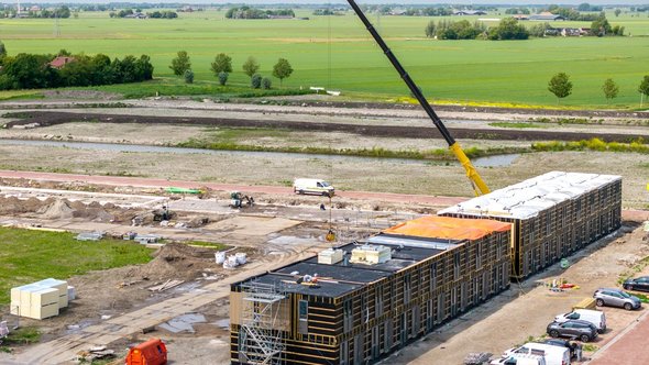 Modular housing under construction door Thomas Roell (bron: Shutterstock)