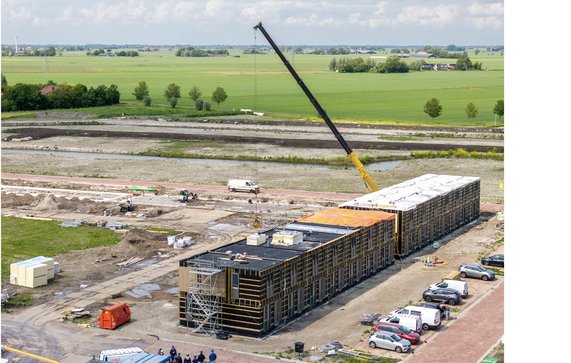 Modular housing under construction door Thomas Roell (bron: Shutterstock)